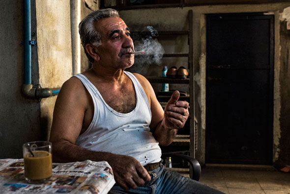 Chance encounters become photographs. While wondering around the streets of Istanbul, this gentleman invited me into his workshop. He is an ironsmith. He made me tea and tried to tell me, to not much avail, in Turkish about his life. What I did get was a portrait of him in a very natural pose, in part, because the camera was so small and non-confrontational and, again, because I actually had it with me, while wondering around the city. | EyeVoyage
