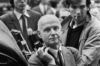 Henri Cartier-Bresson using a 50mm F1.2 Noctilux when he shot the riots in Paris in 1968.