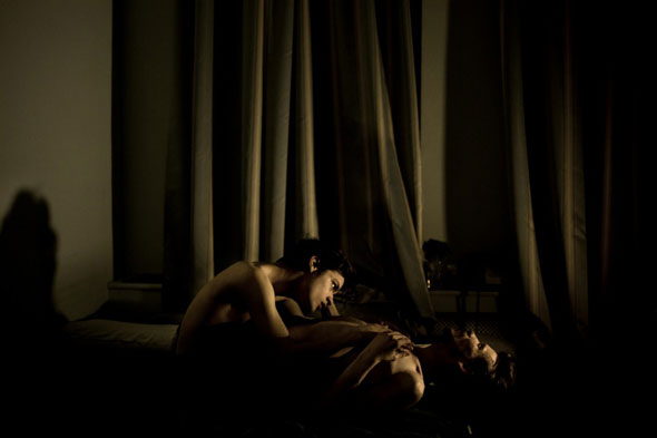 World Press Photo of the Year 2014 -- Contemporary Issues, 1st prize singles, Mads Nissen: Jon, 21, and Alex, 25 are a couple. Being lesbian, gay, bisexual or transgender (LGBT) is becoming more and more difficult in Russia.